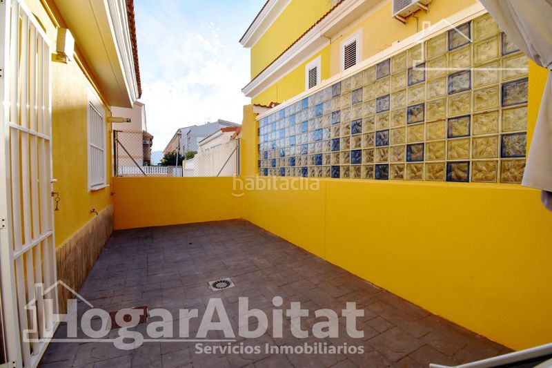 Foto d827dd62-51e2-415b-a216-5a369ac232bb. Casa adossada amb calefacció aparcament piscina a Cullera