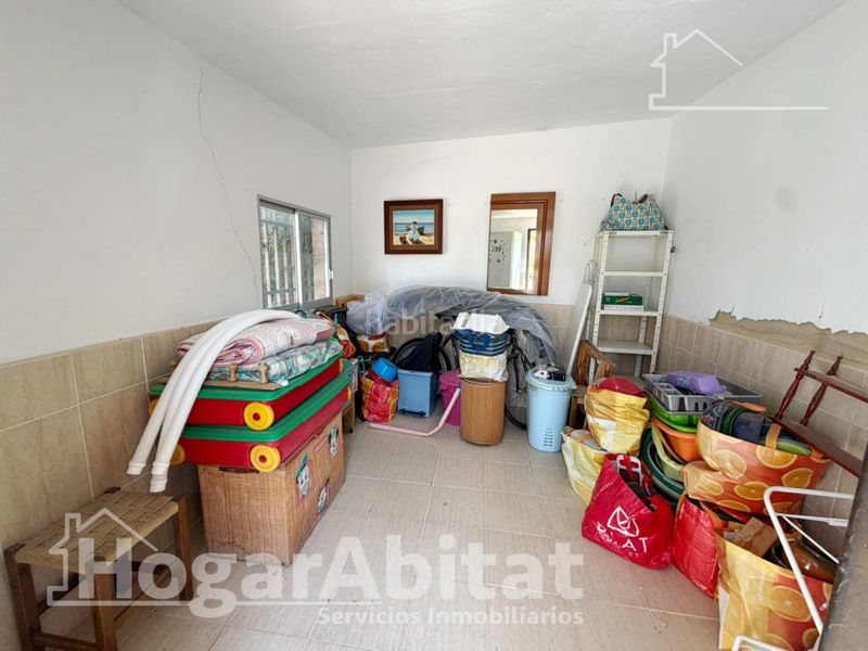 Foto 080a041a-7895-40b9-8ee7-83e1ea0c0fe4. Chalet  con piscina, garaje y terraza en Urbanizaciones Llíria