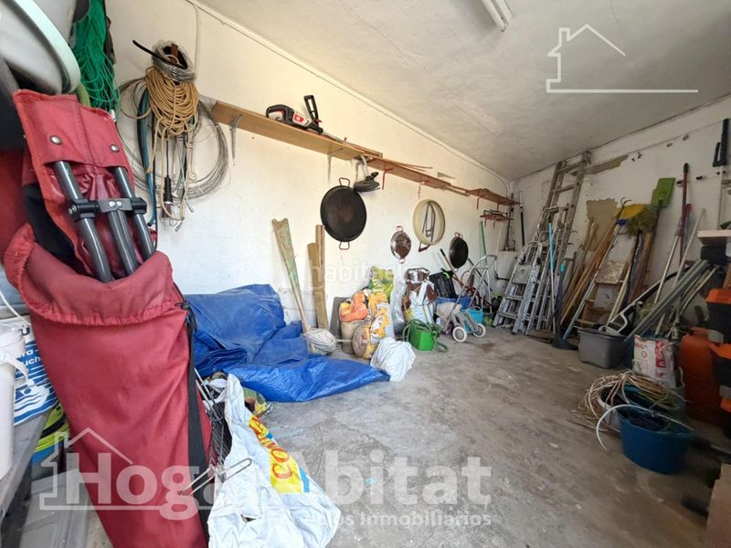 Foto 5e025653-b168-4c9e-83de-839e7a896389. Chalet  con piscina, garaje y terraza en Urbanizaciones Llíria