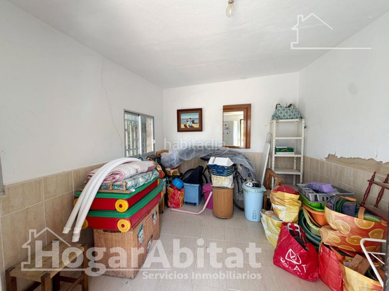 Foto d6f129bb-a9ab-4161-abb8-feaffa12b586. Chalet  con piscina, garaje y terraza en Urbanizaciones Llíria