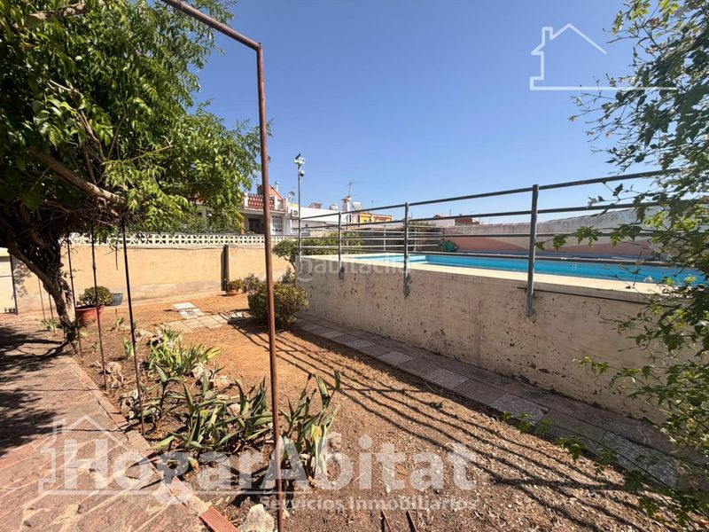 Foto b09499ac-d9c8-4f78-9e7b-63e5fe2b60a0. Casa amb aparcament piscina a Benaguasil