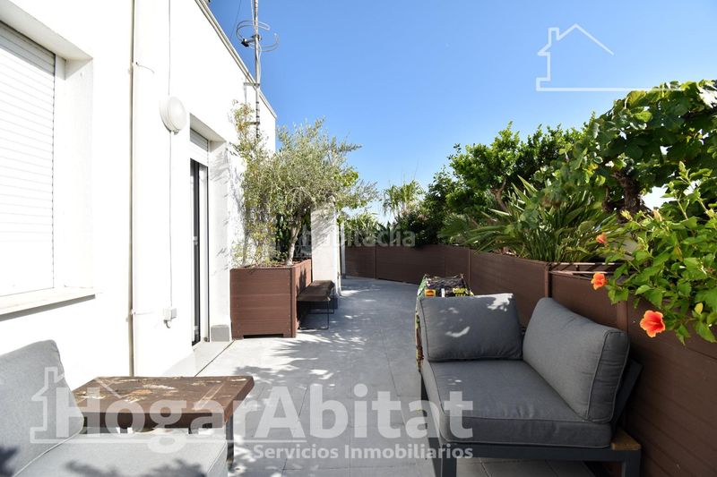 Foto 1bd25153-6557-4134-afe4-b17147a2eb00. Casa adossada amb aparcament a Guardamar