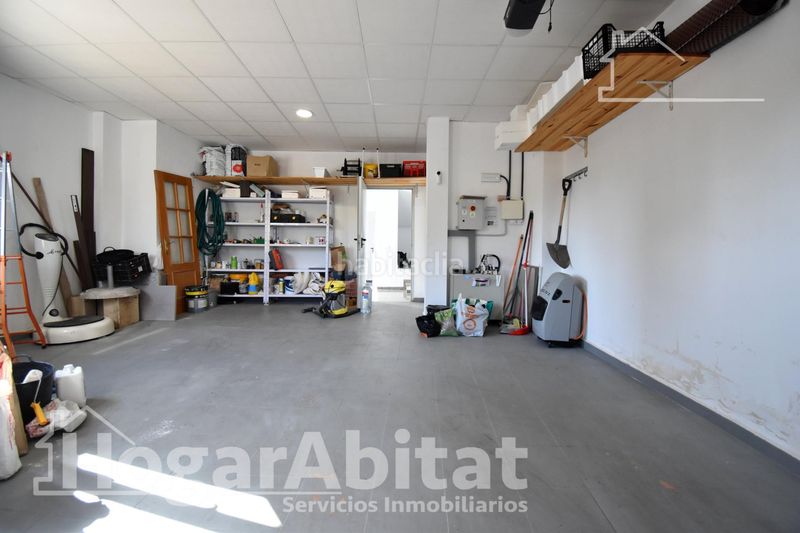 Foto 18bbe72b-f21a-4ab4-82b1-6514b4f6d47e. Casa adossada amb aparcament a Guardamar