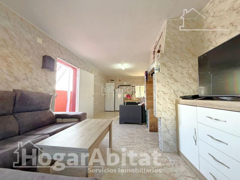 Foto 10e9f43a-d513-41b7-b574-a080f5f7f99a. Chalet  con piscina, garaje, terraza y barbacoa en Vilamarxant
