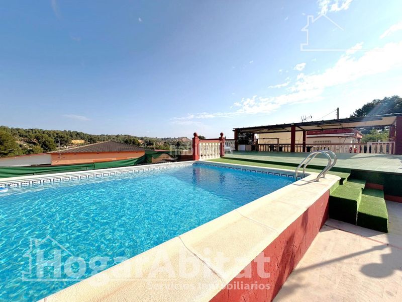 Foto 5b2ba9db-a33f-48b3-84b0-8920dc20dcbc. Chalet  con piscina, garaje, terraza y barbacoa en Vilamarxant
