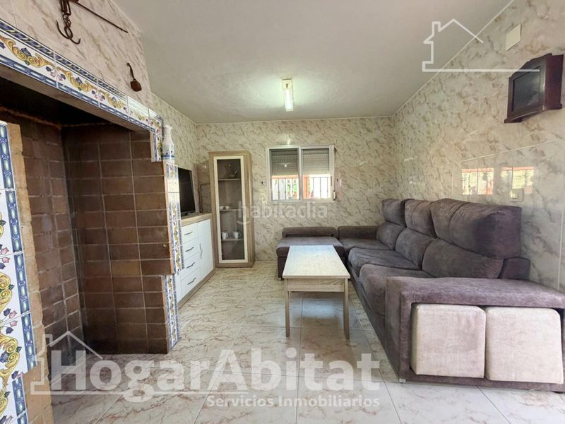 Foto 6882f483-04cf-4fa4-95bd-7da6b7209bd6. Chalet  con piscina, garaje, terraza y barbacoa en Vilamarxant