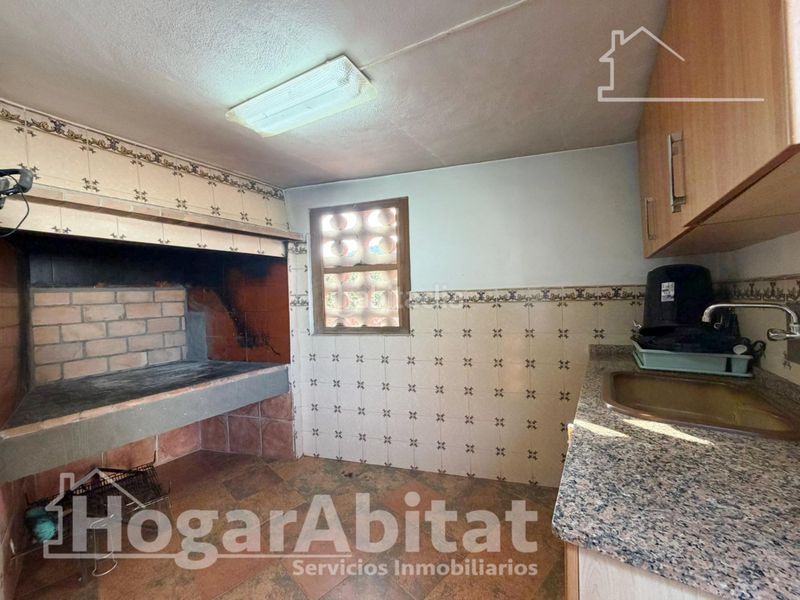 Foto f4abfb4b-71a1-40b6-ac10-1ef6e7942333. Chalet  con piscina, garaje, terraza y barbacoa en Vilamarxant