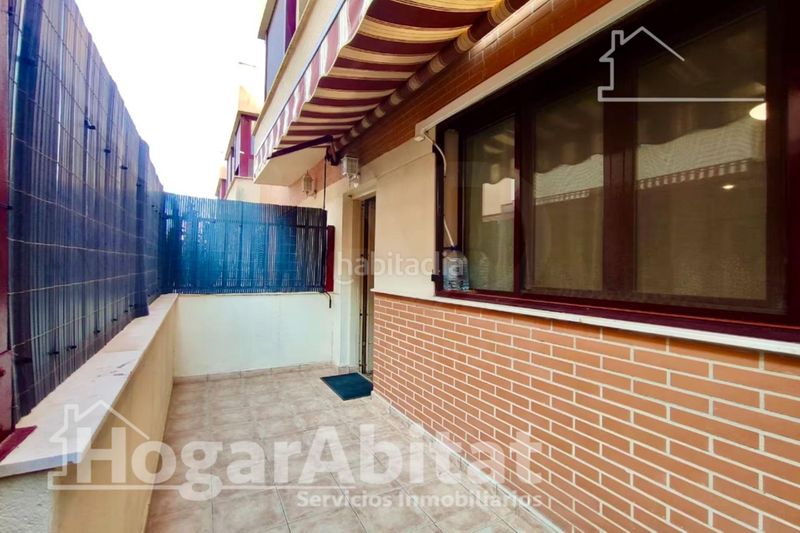 Foto 2cfc49a9-65a3-42aa-9f95-5cb070e3d74d. Casa adosada precioso adosado en residencial con piscina, garaje y dos terrazas en Sagunt