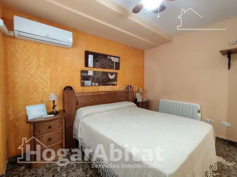 Foto 5bb8c40b-5c62-4d2a-867b-bb6511018581. Casa adosada precioso adosado en residencial con piscina, garaje y dos terrazas en Sagunt
