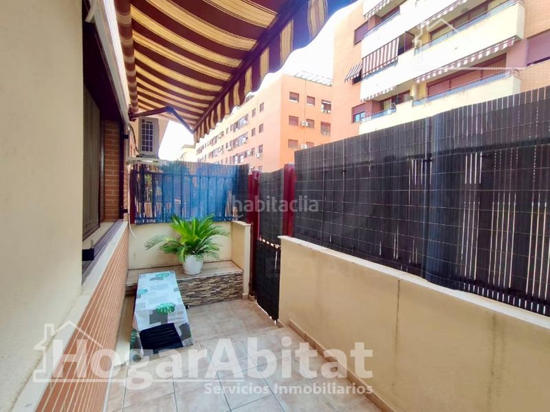 Foto 9a7e5484-a9a6-44d7-b0c3-6c1c65e9e200. Casa adosada precioso adosado en residencial con piscina, garaje y dos terrazas en Sagunt