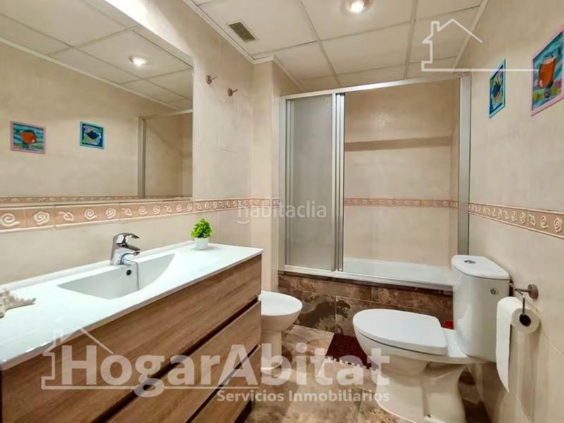 Foto dd731e91-bbd1-4f2b-b412-500b68da6ccf. Casa adosada precioso adosado en residencial con piscina, garaje y dos terrazas en Sagunt