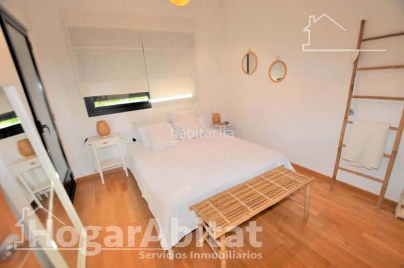 Foto 039a5de8-f34b-43cf-822d-c2cbe4a2a3af. Casa adosada gran adosado en residencial, sofisticado y luminoso con garaje y dos terrazas en San Antonio de Benagéber