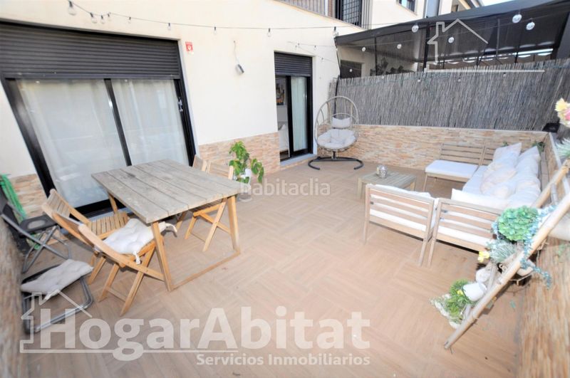 Foto 75a1d3e1-f38e-43d7-8c5d-1f57c070a5a8. Casa adosada gran adosado en residencial, sofisticado y luminoso con garaje y dos terrazas en San Antonio de Benagéber