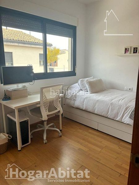 Foto ac241024-718c-41e6-b80c-d9b475feafcd. Casa adosada gran adosado en residencial, sofisticado y luminoso con garaje y dos terrazas en San Antonio de Benagéber