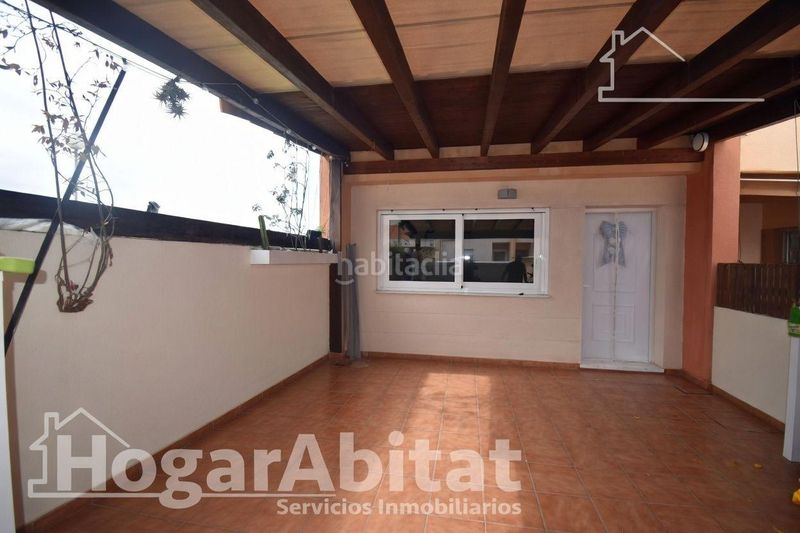 Foto 9a63cf1a-b214-4f61-8cba-7567ce3a02e8. Casa adossada amb calefacció aparcament piscina a Almazora / Almassora
