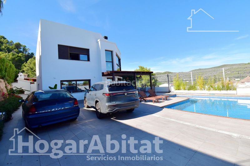 Foto 315a8739-a976-4c77-ac63-8de1e86987f3. Chalet with parking pool in Urbanizaciones Gandia