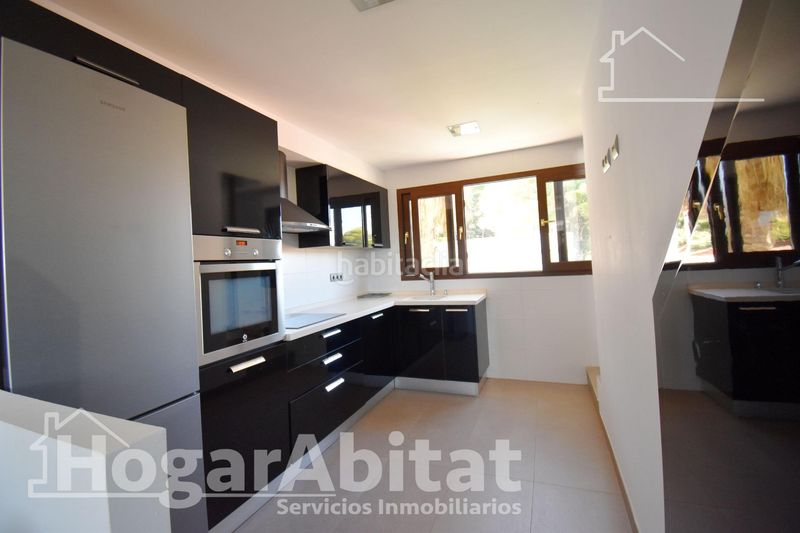Foto 50ae6edf-3a34-4543-b81d-7f82549e3c8a. Chalet with parking pool in Urbanizaciones Gandia