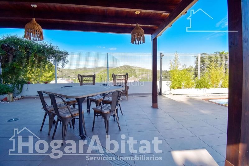 Foto b5dd07cb-9c47-458f-8ebc-66572c60b667. Chalet with parking pool in Urbanizaciones Gandia