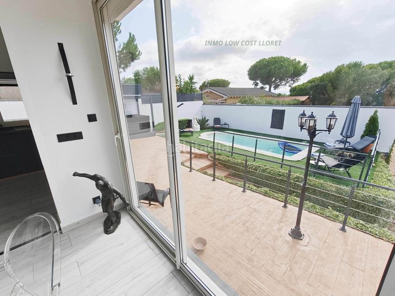 Foto 4bfc4145-97e6-4657-ae20-b04c903a1fe7. Casa amb aparcament piscina a Aiguaviva Parc Vidreres