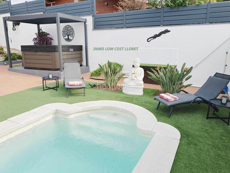 Foto 9fa28f4a-b6a0-4411-983e-ee36069e89e2. Casa amb aparcament piscina a Aiguaviva Parc Vidreres