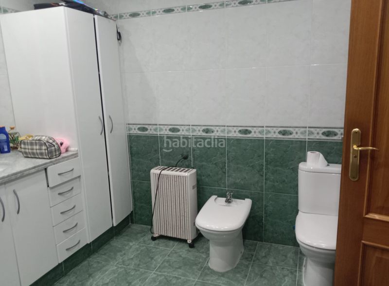 Foto 502b3e7e-2527-41bb-a150-74b51dc63833. Casa amb aparcament a Sollana