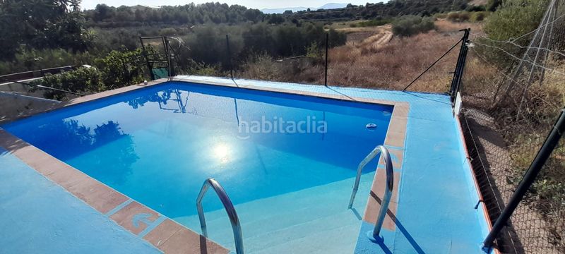 Foto a26e7e6e-3a7c-4512-9c04-8530dab37310. Casa chalet con piscina, placas solares y gran parcela en entorno natural. solana en Cheste