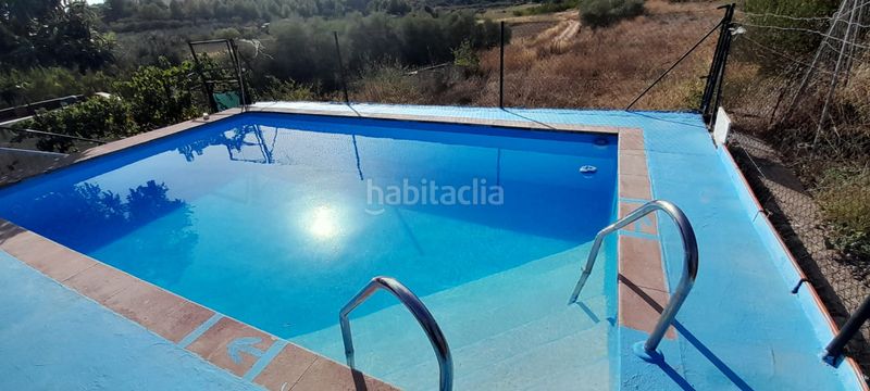 Foto ceddf815-af28-49cd-b4cc-512a19e85eff. Casa chalet con piscina, placas solares y gran parcela en entorno natural. solana en Cheste