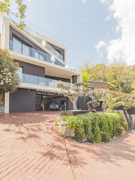 Foto 11b1dadb-1df6-42b9-b3a6-483568acd62f. Casa amb calefacció aparcament piscina a Les Planes Sant Cugat del Vallès