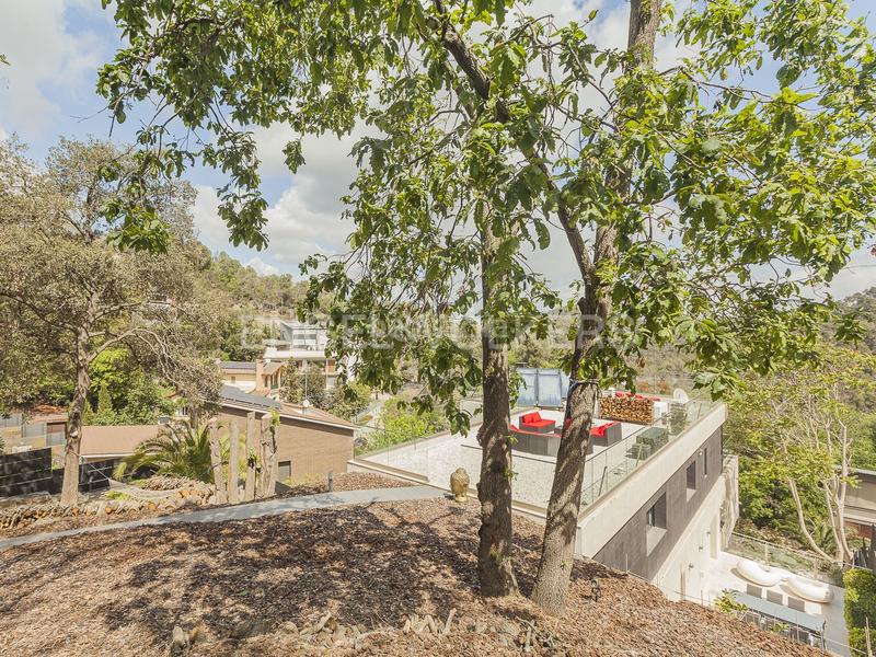 Foto 29c6c6d7-06a1-4c6a-a270-0c09491eea5c. Casa amb calefacció aparcament piscina a Les Planes Sant Cugat del Vallès