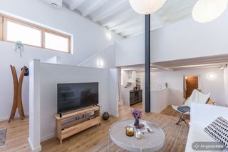 Pis a Sants. Luminoso loft esquinero de diseño moderno