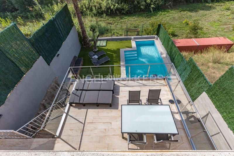 Foto f208bd57-789e-45a6-b06d-825986358ad3. Casa  de ensueño con piscina, vistas panorámicas y apartamento independiente. en Dosrius