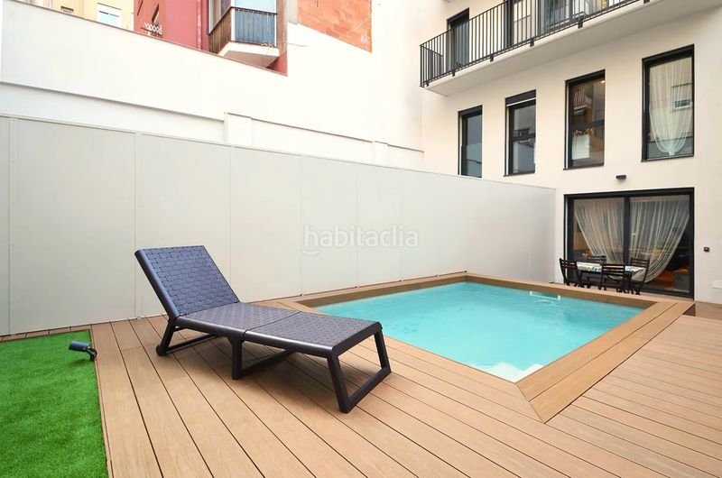 Foto 09ae872c-d677-4842-a232-2240f50911d4. Zweistöckige wohnung 112m<sup>2</sup> mit heizung pool in Vila de Gràcia Barcelona