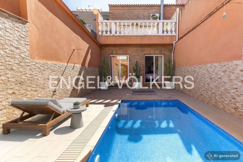 Foto b367e98d-08ba-4312-9f85-a2828f7f92a9. Casa adossada amb calefacció aparcament piscina a Barcelona