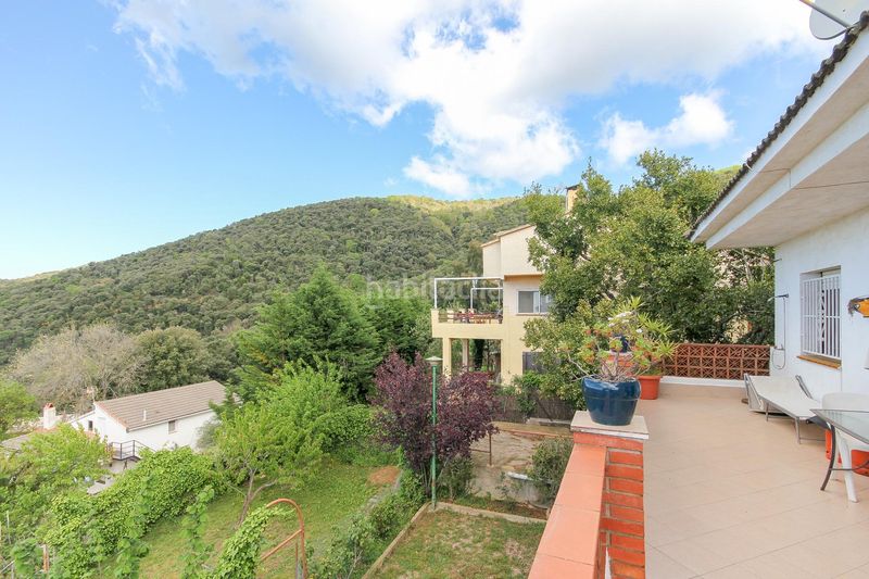 Foto 4b78378e-b31b-45f2-a23f-009ed1b8203e. Chalet casa con vistas al mar, amplio jardín con frutales y pozo propio en Sant Iscle de Vallalta