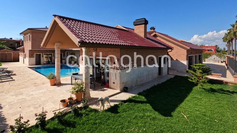 Foto e7e1cc54-7e02-40b9-9473-de2a9beb4c47. Chalet mit heizung parking pool in Playa Burriana