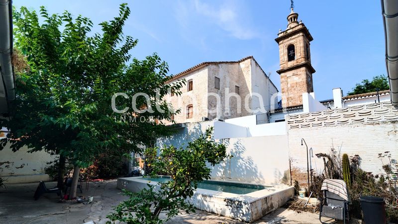 Foto 84fbe998-80ea-4c93-a0ed-1ca94a59bbb0. Xalet amb aparcament piscina a Massarojos Valencia