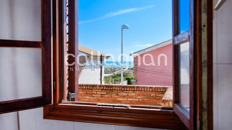 Foto 2d240620-5a36-45e2-8450-fa2184cc6258. Chalet with parking in Corinto-Almardà Sagunt