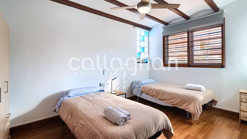 Foto f5a655df-6938-4fae-8ea0-e92bbeea7d59. Casa adossada amb calefacció aparcament a Corinto-Almardà Sagunt