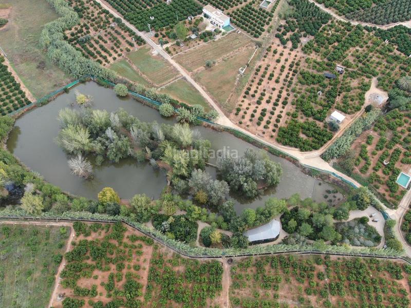Foto 6046b02d-ced1-4ec8-9180-cd22729122f4. Masía finca rustica del lago, una propiedad exclusiva en Alzira