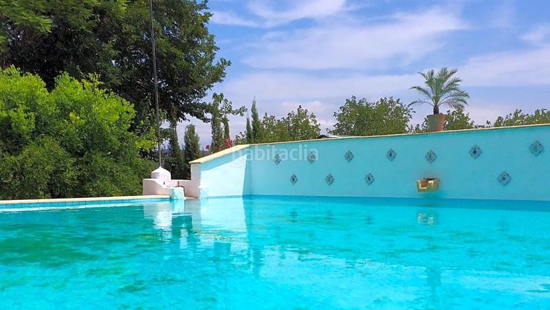 Foto effb20cc-813c-49c3-9084-24ad142f4ca0. Masía finca rustica del lago, una propiedad exclusiva en Alzira
