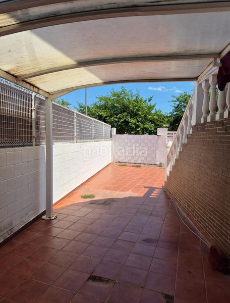 Foto 525ca532-ccd5-42ee-bf93-70110c477159. Casa a schiera con riscaldamento parcheggio piscina in Gandia