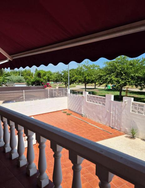 Foto 94ef133e-bae9-4d40-b46a-23c305fa9375. Casa a schiera con riscaldamento parcheggio piscina in Gandia