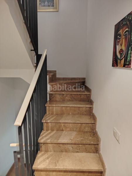 Foto b677a729-0da7-45d4-811b-92754e9fcd1a. Casa adossada amb calefacció aparcament piscina a Reus