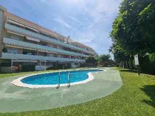 Piso  Tarragones del. Planta baja con jardín en la urbanización poblamar