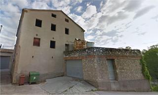 Casa a Carme. Habitatge  garatge i magatzem industrial