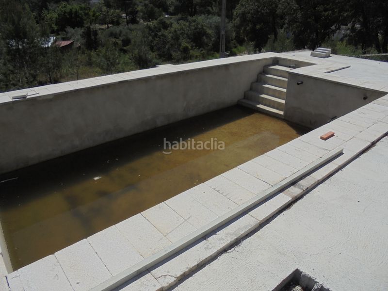 Foto dde503fa-1158-4472-a4d4-561eef9132ae. Xalet amb piscina a Macastre