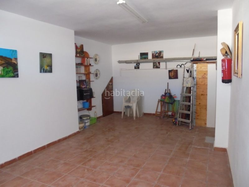 Foto f5c3b29e-ad06-467e-a53d-dc35499d04f2. Casa adossada a Camporrobles