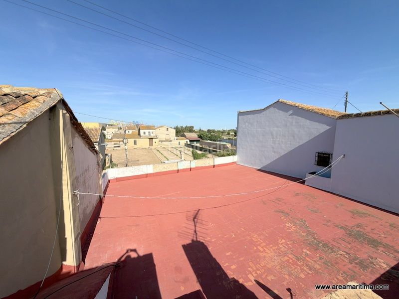 Foto 175eafd0-afd9-4864-9330-9238ee631771. Casa adossada a La Punta Valencia