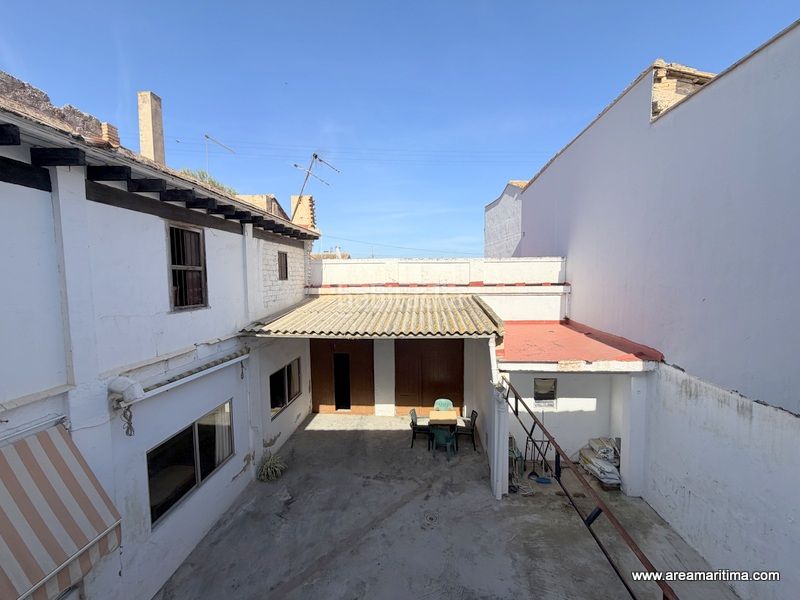 Foto 5eea2b47-b5f9-40a9-869f-54d9130a2c65. Casa adossada a La Punta Valencia