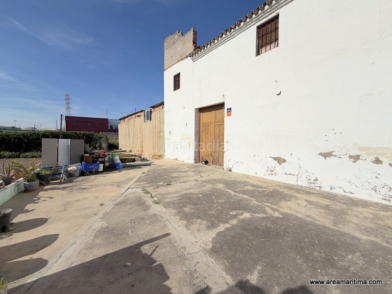 Foto 9b312f9d-8466-476d-b82f-3974a076b1a0. Casa adossada a La Punta Valencia